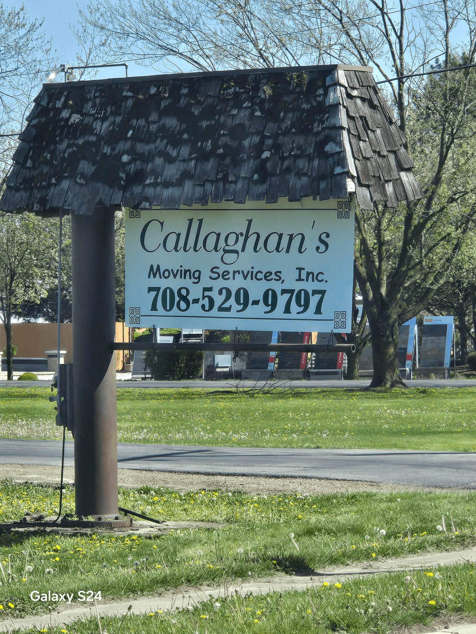 Callaghan Moving Services Inc. sign in front of their building.