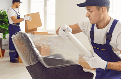 Callaghan's Moving Services Inc. moving and packing crew preparing items for a long distance move.